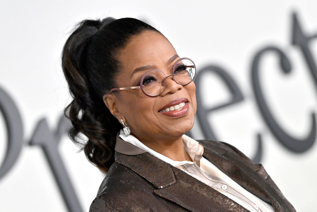 A closeup of Oprah at a media vent