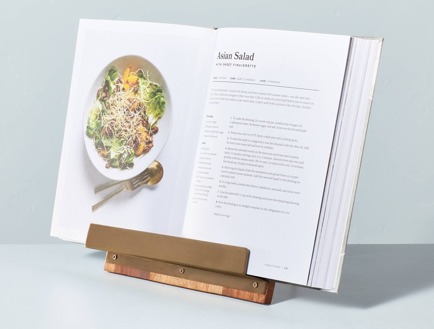 The holder with an open cookbook on it