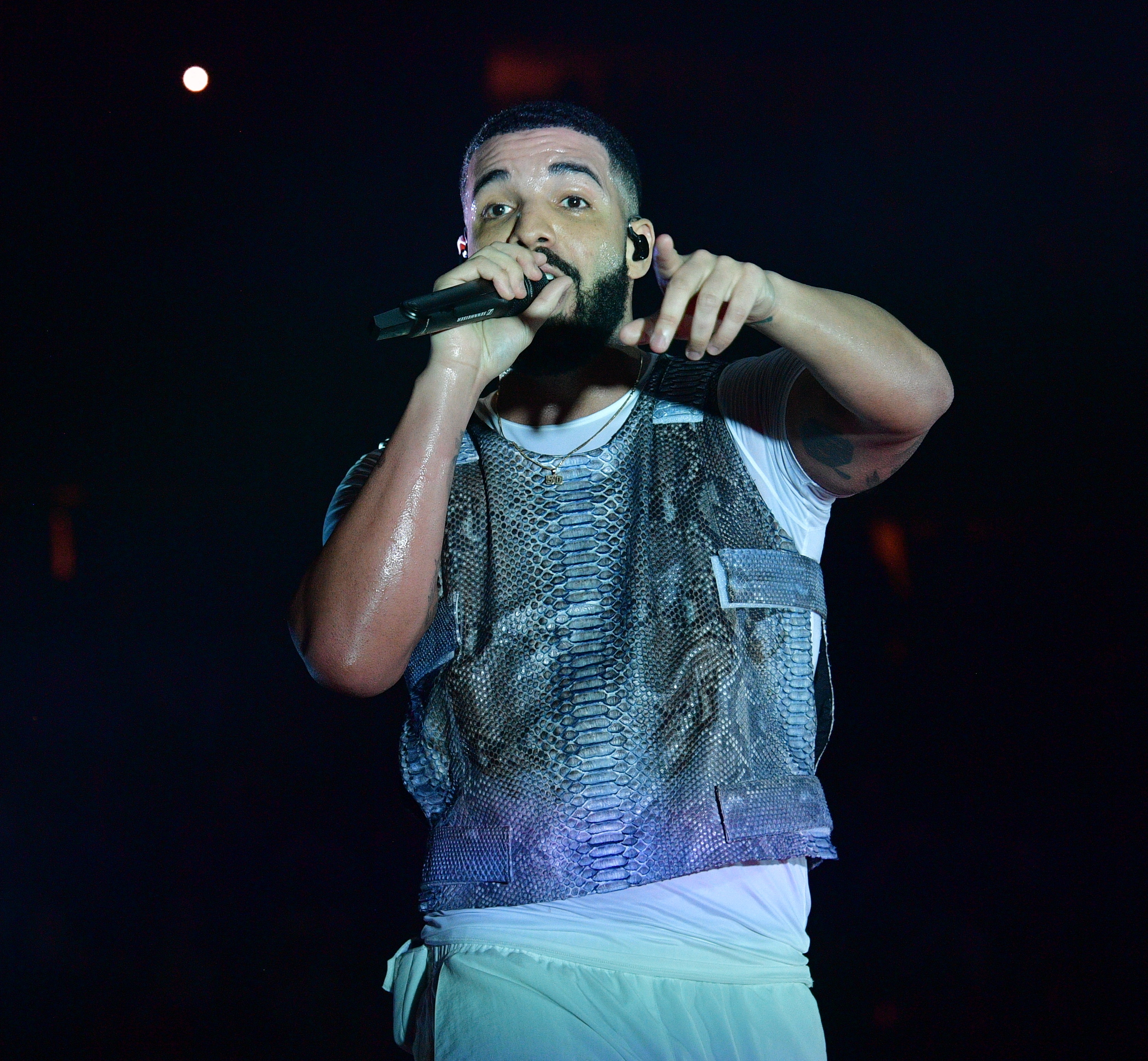 Drake performing on stage