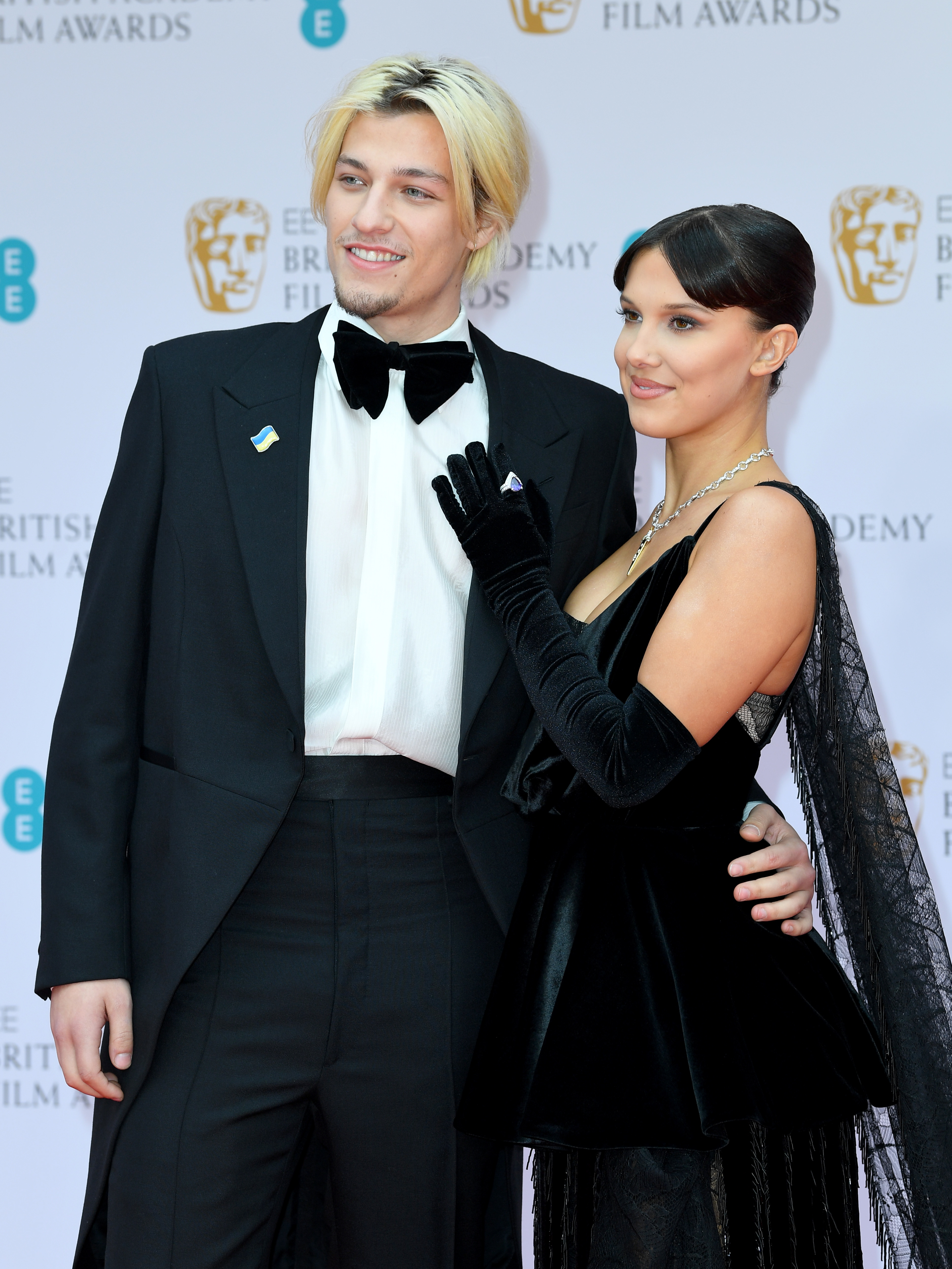 The couple with their arms around each other at the BAFTAs