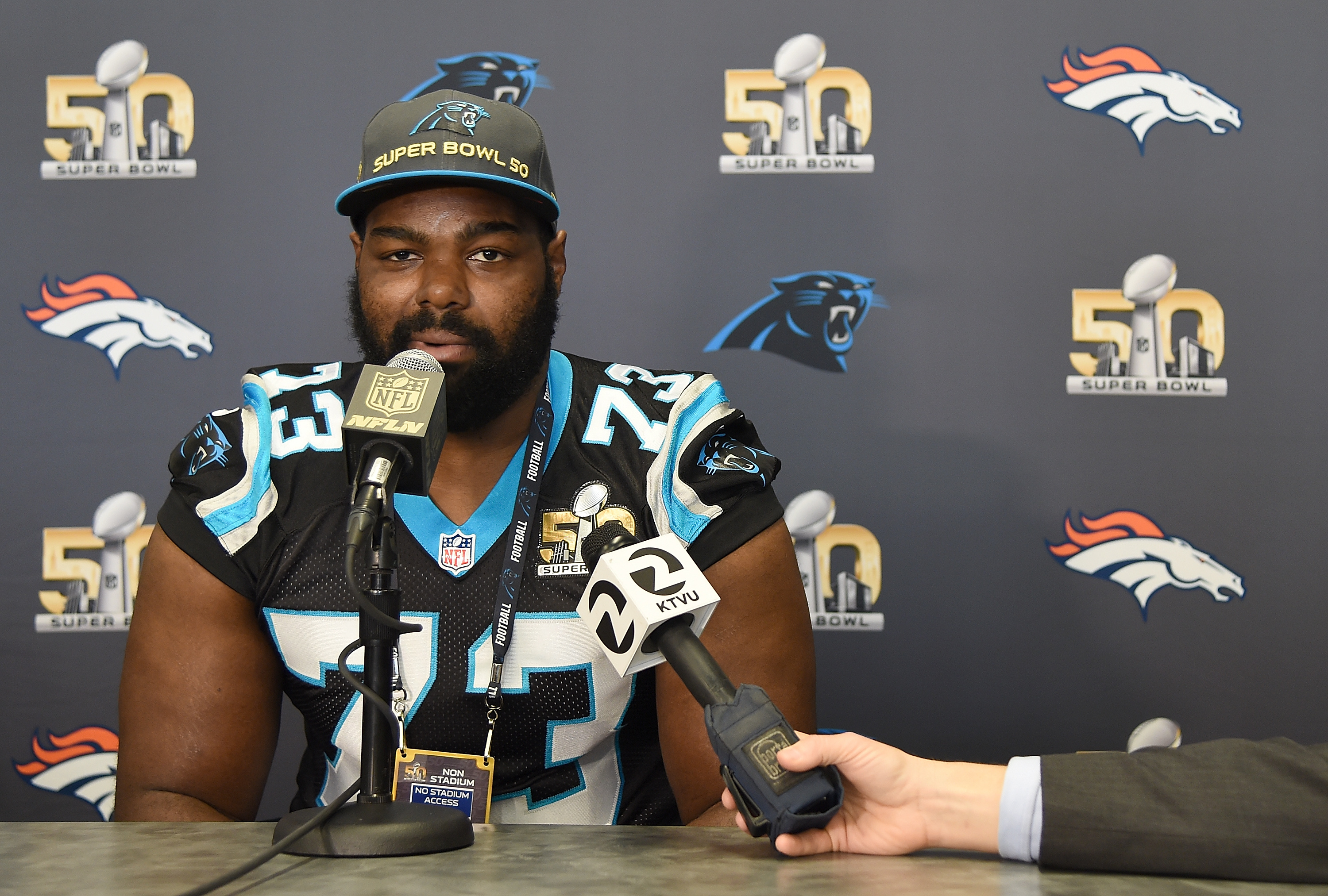 Michael Oher in a press conference