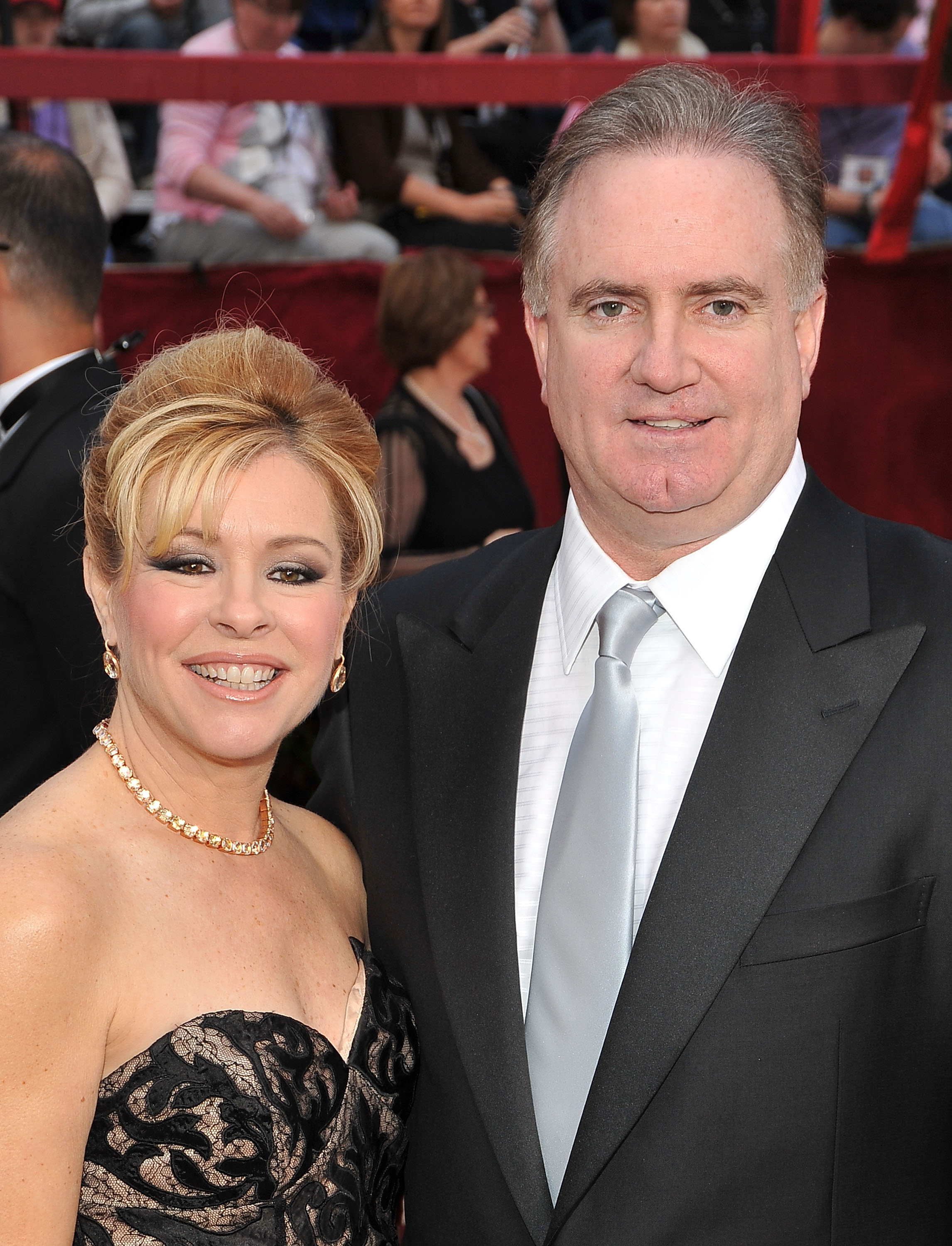 A closeup of Leigh Anne and Sean Tuohy at a formal event