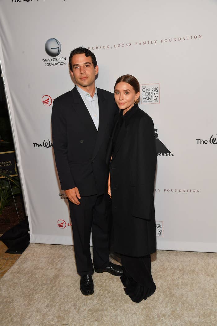 Ashley Olsen and Louis Eisner for photographers at an event