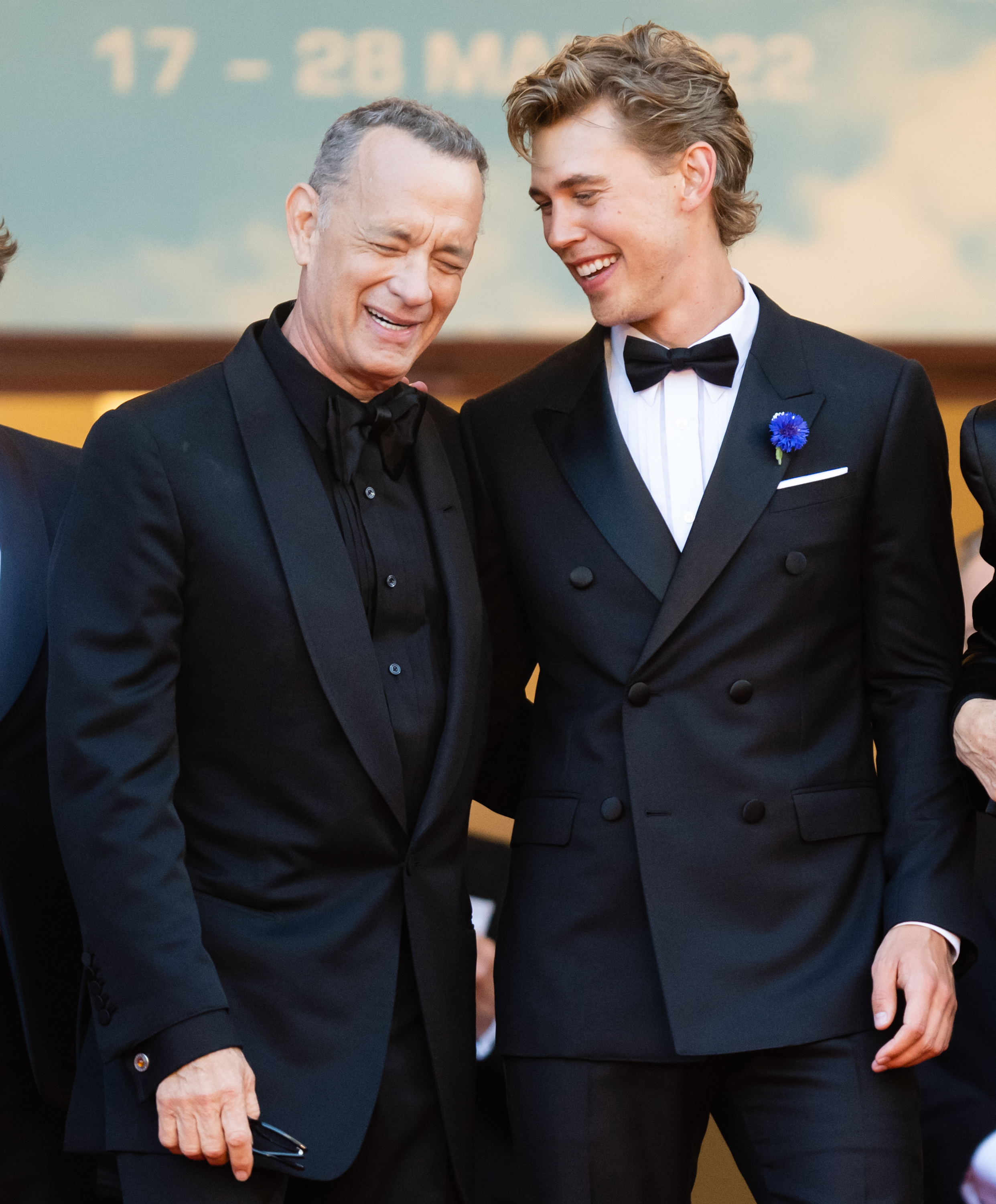 Closeup of Tom Hanks and Austin Butler laughing together