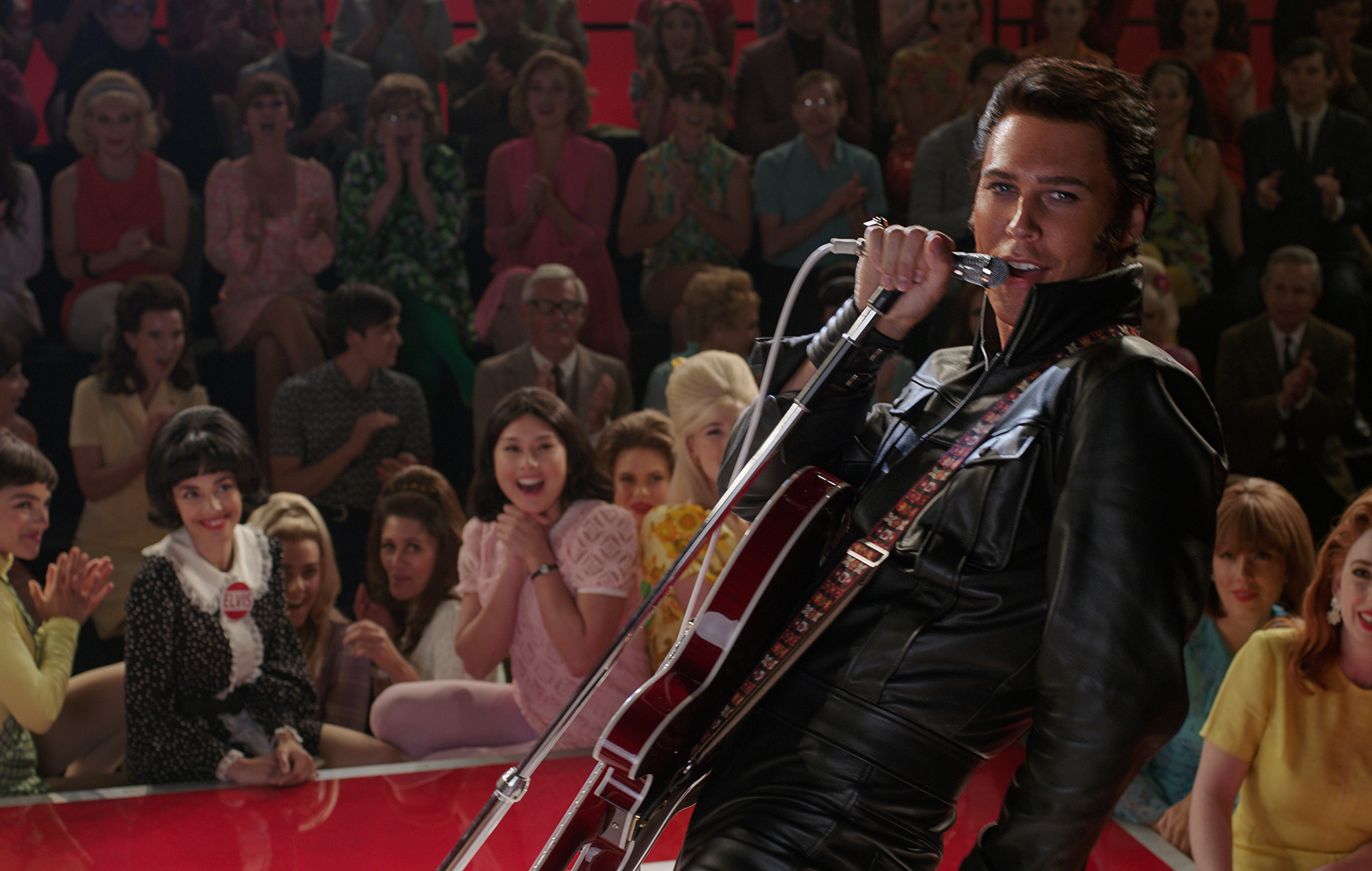 Austin as Elvis performing for an enraptured audience