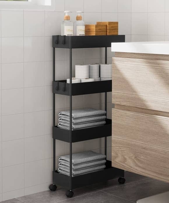 the black utility rack in a bathroom