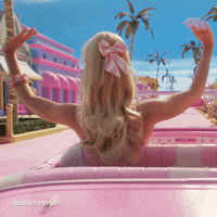 Barbie waving from her car