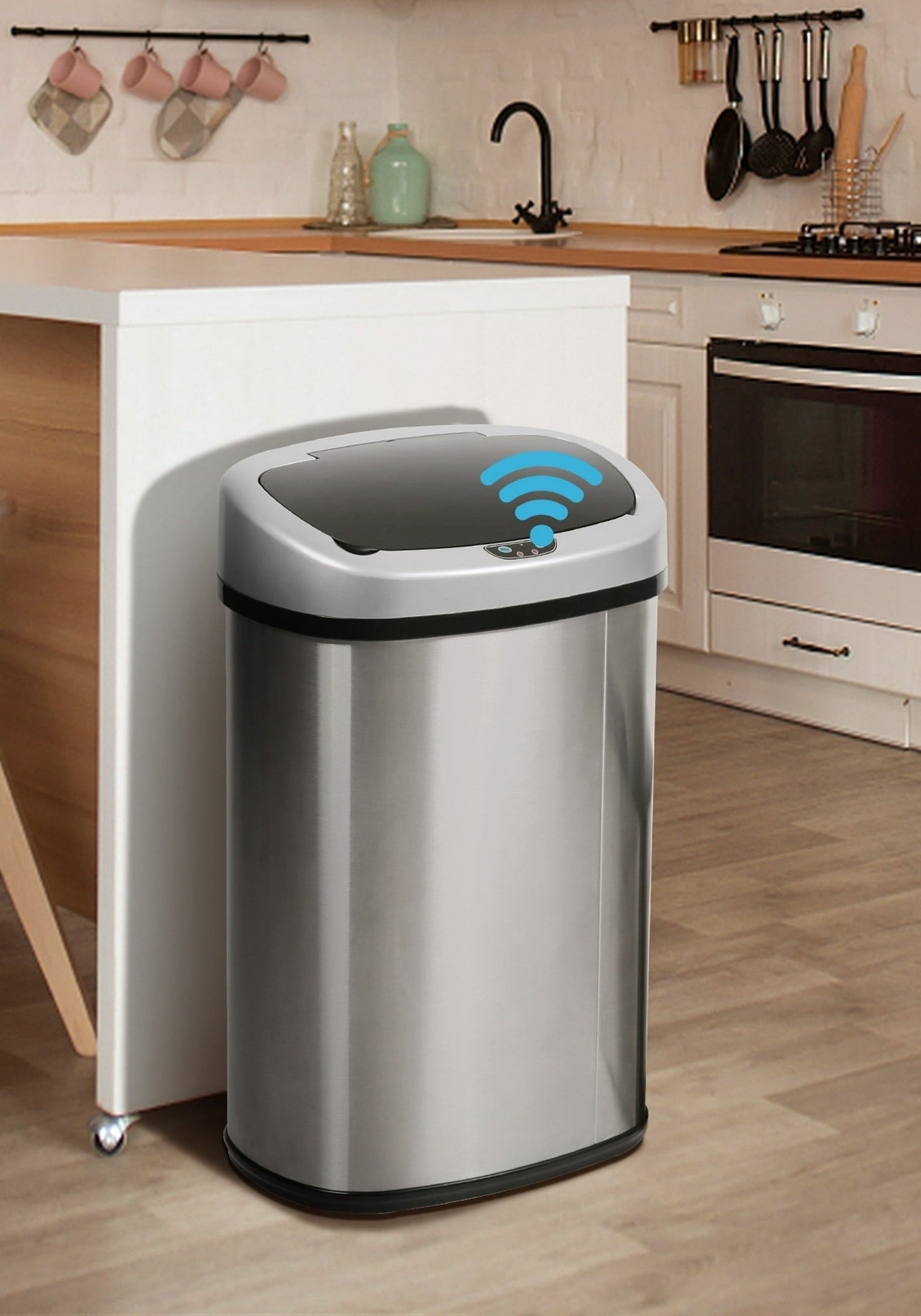 a stainless steel trash can in a kitchen