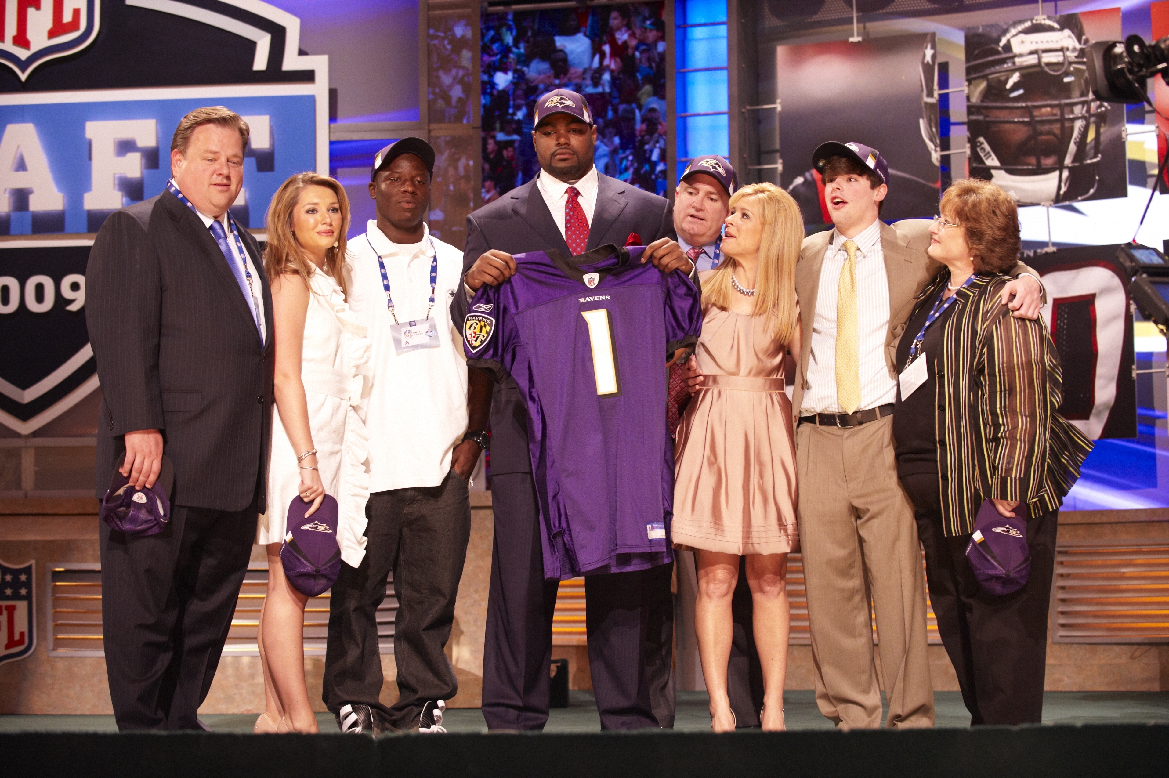 Michael Oher and the Tuohys when he was drafted to the Baltimore Ravens