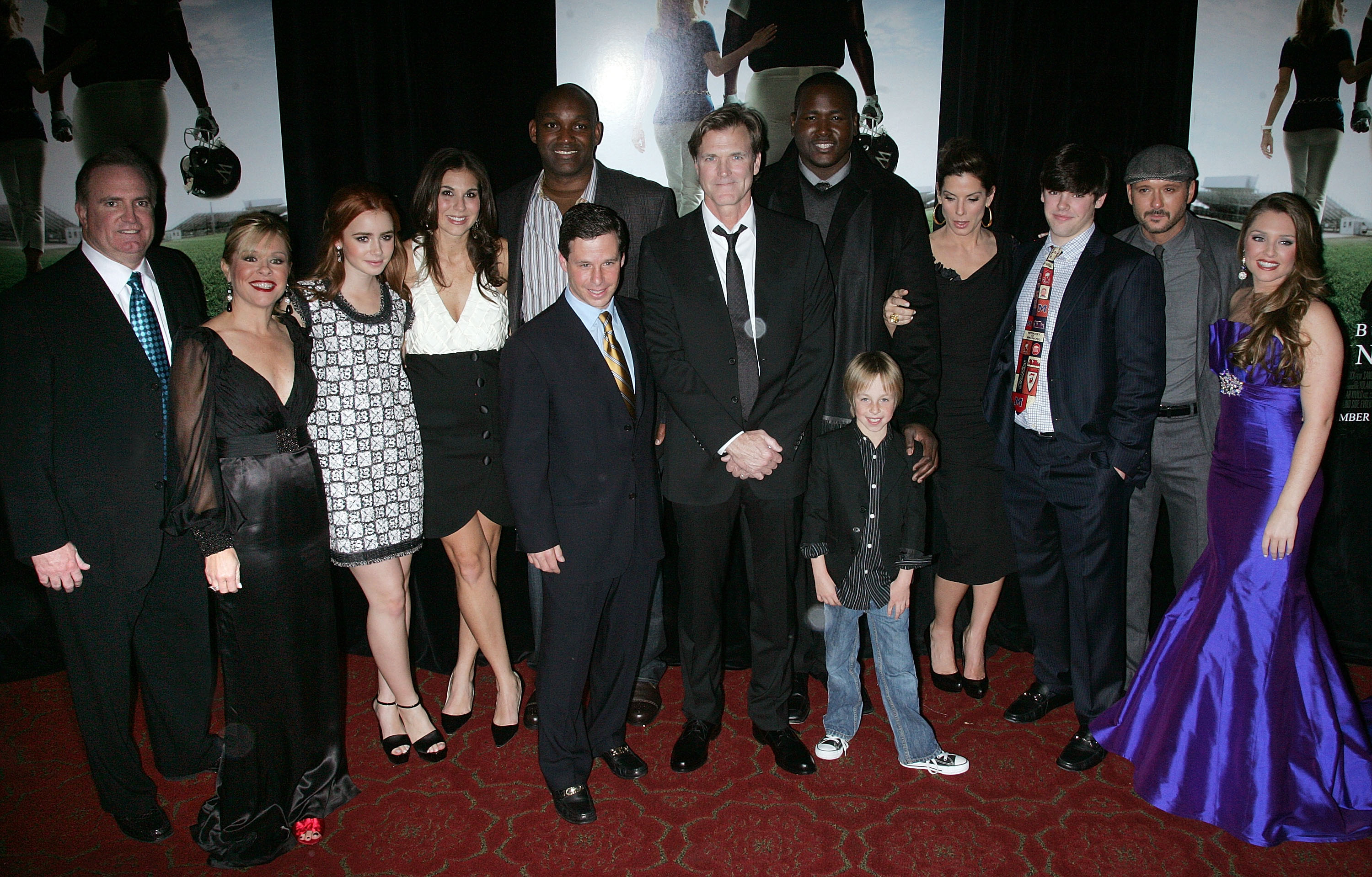 The Tuohys and some cast members of the Blind Side take a group photo