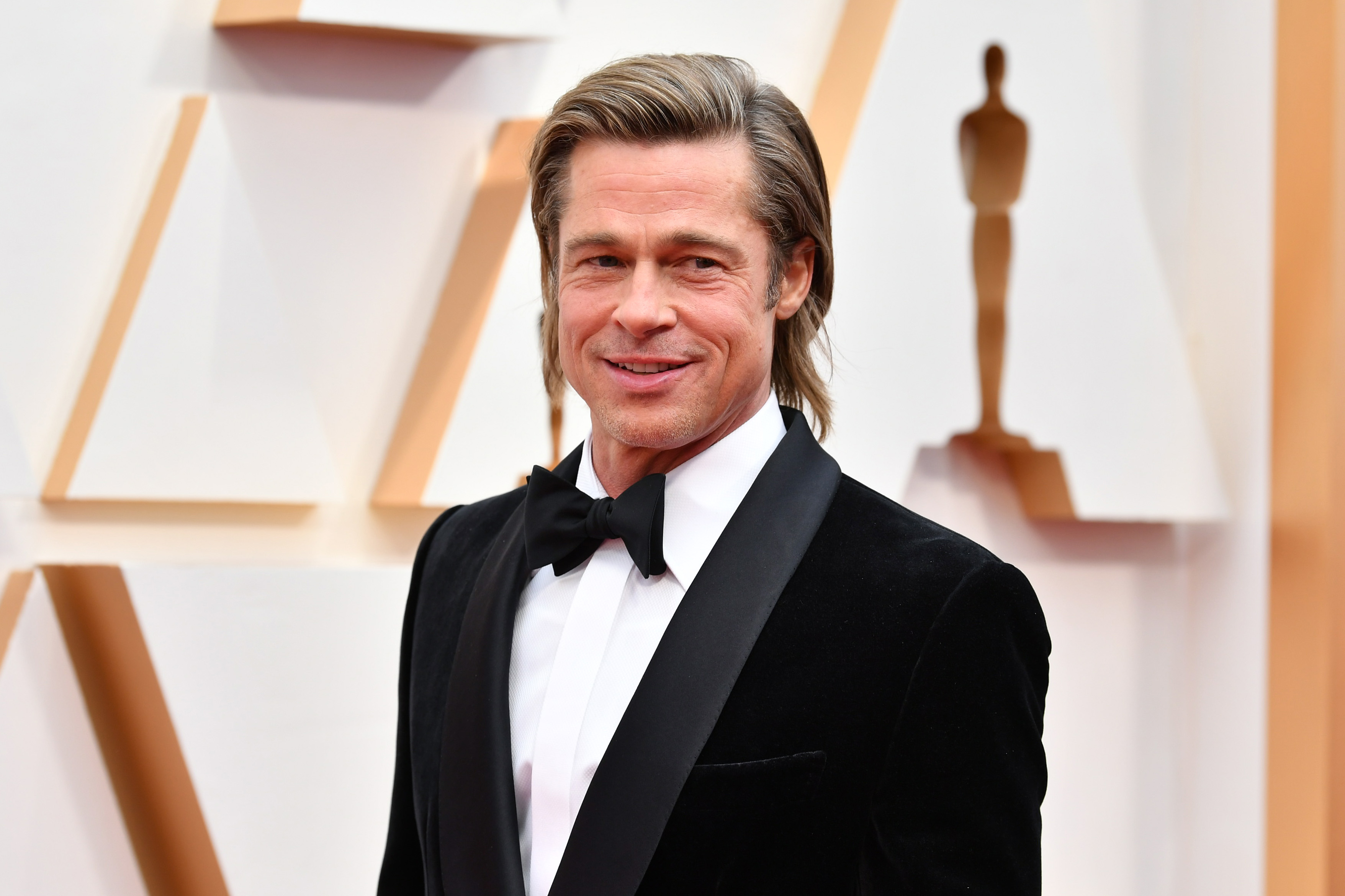 Close-up of Brad in a bow tie at a media event