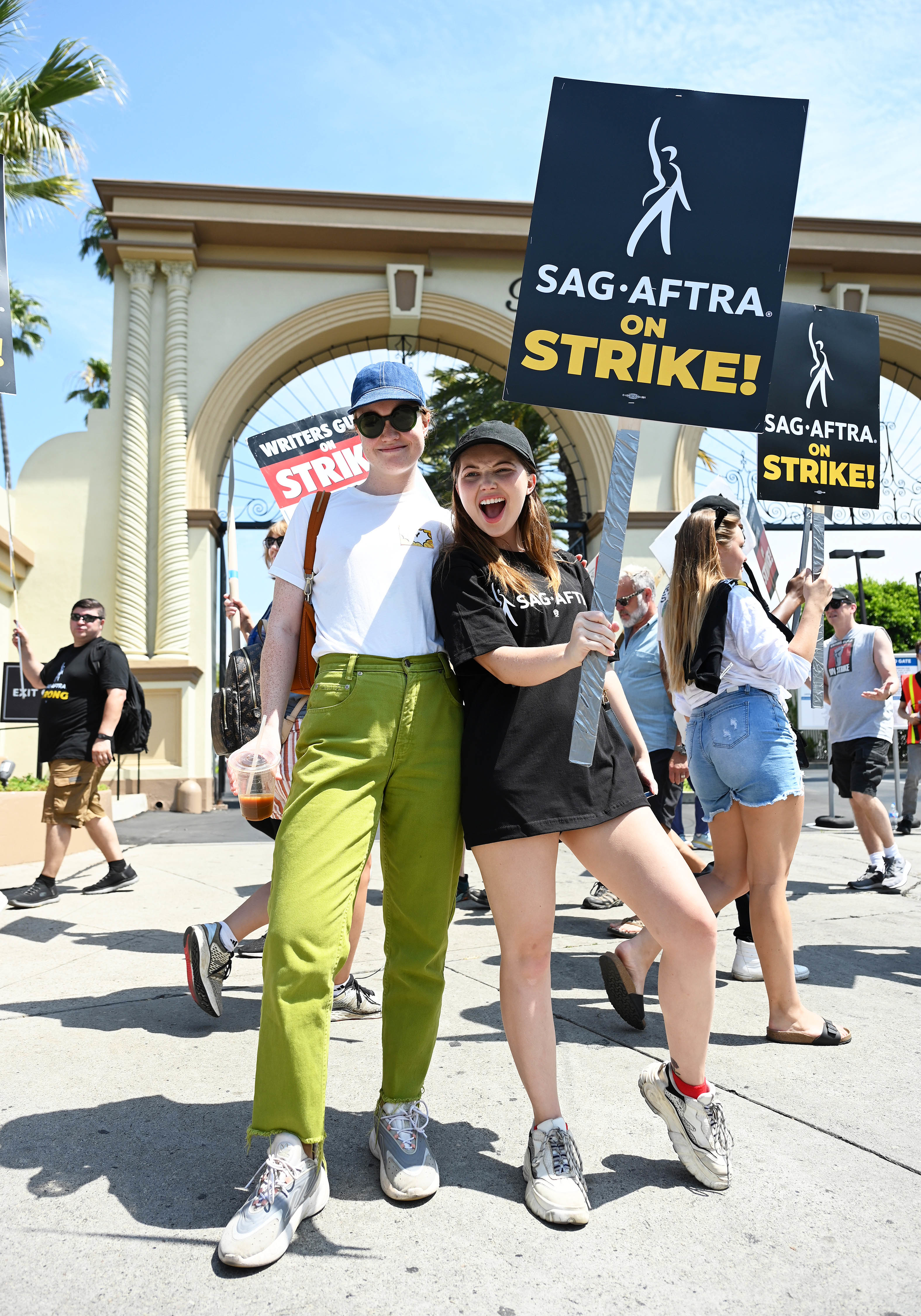 Liv Hewson and Samantha Hanratty at a protest
