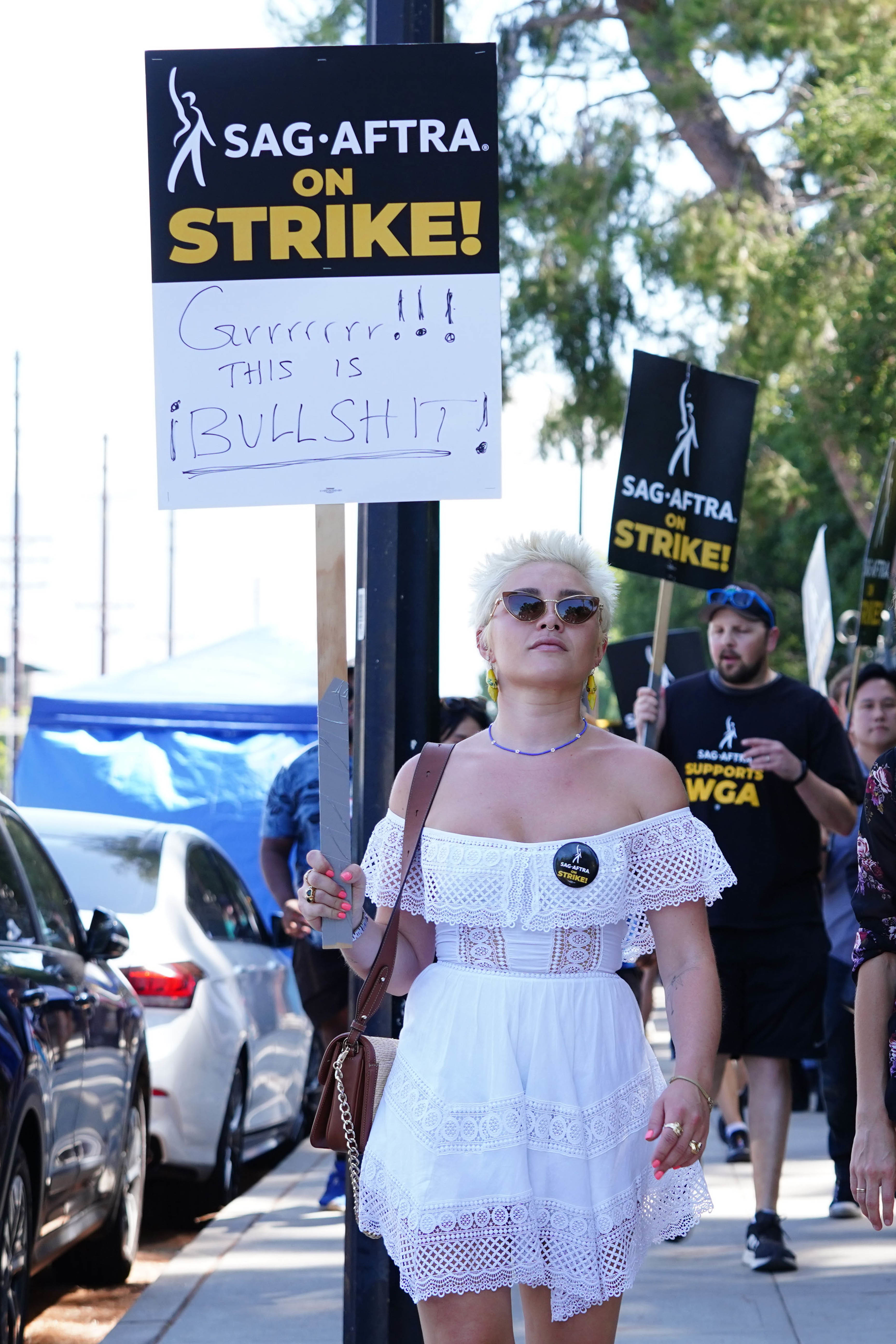 Florence holding her sign at the picket line
