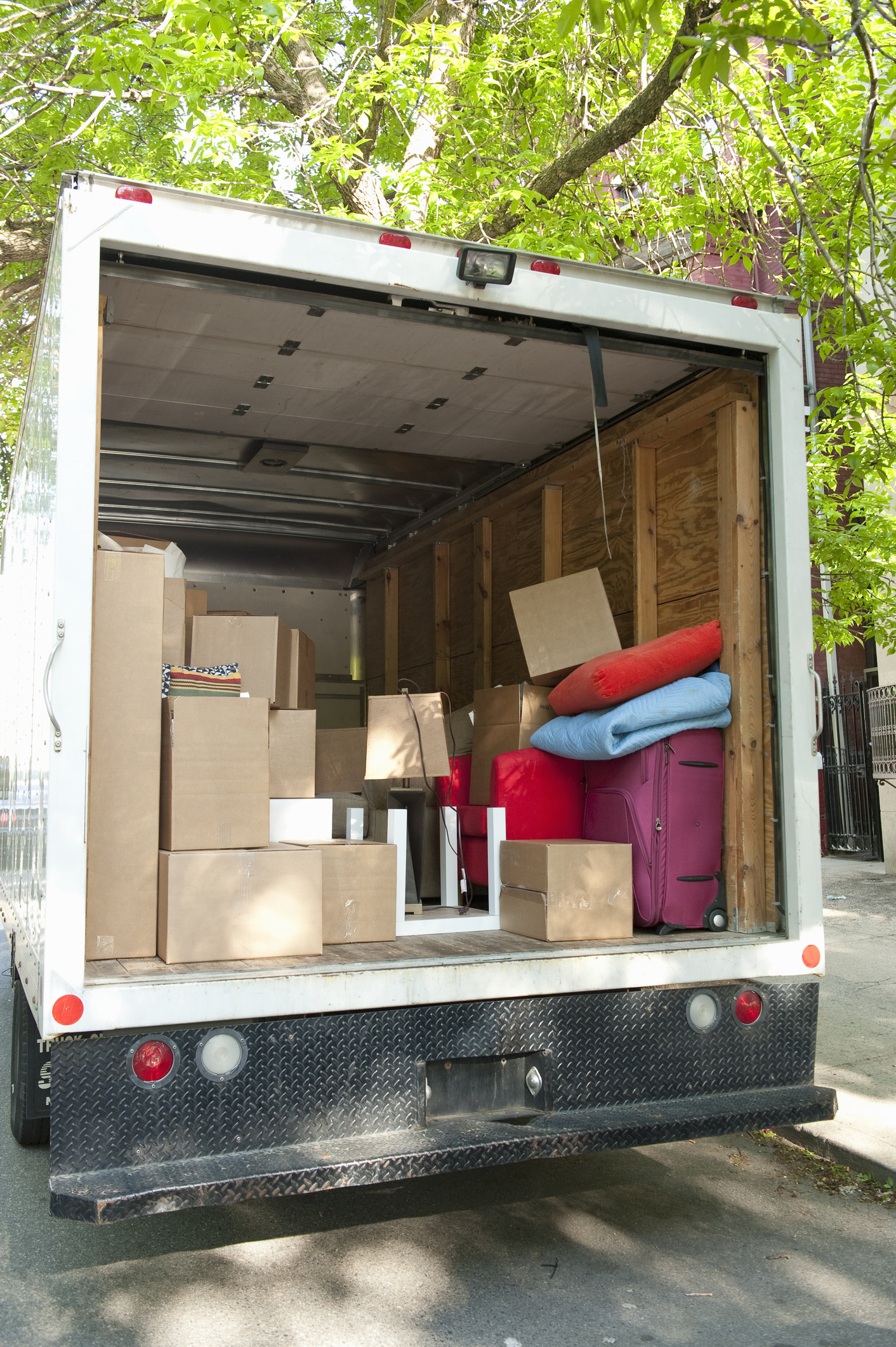 A moving truck filled with items
