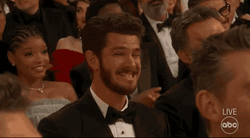 GIF of Andrew Garfield making a cringey face