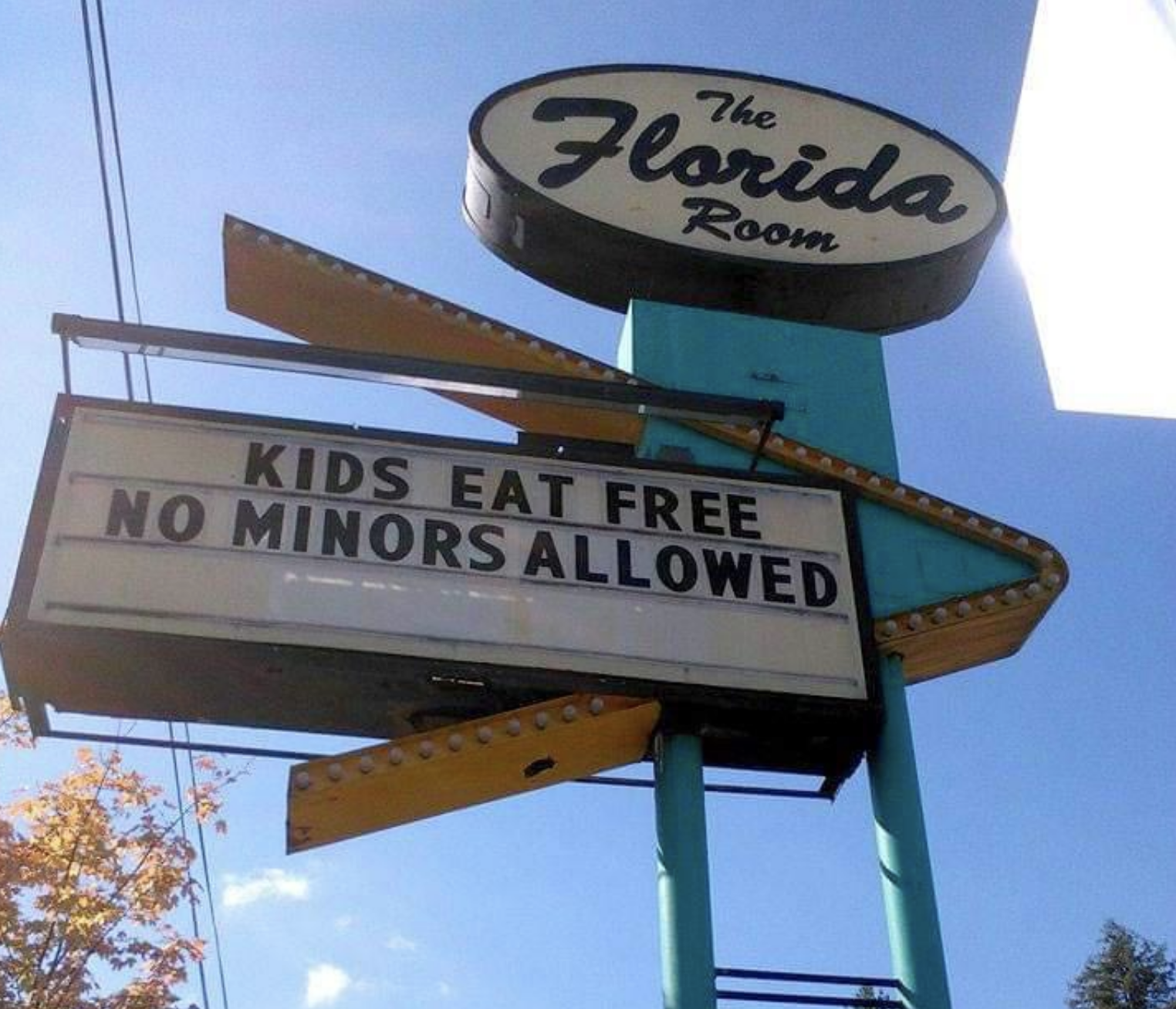 marquee reads kids eat free no minors allowed