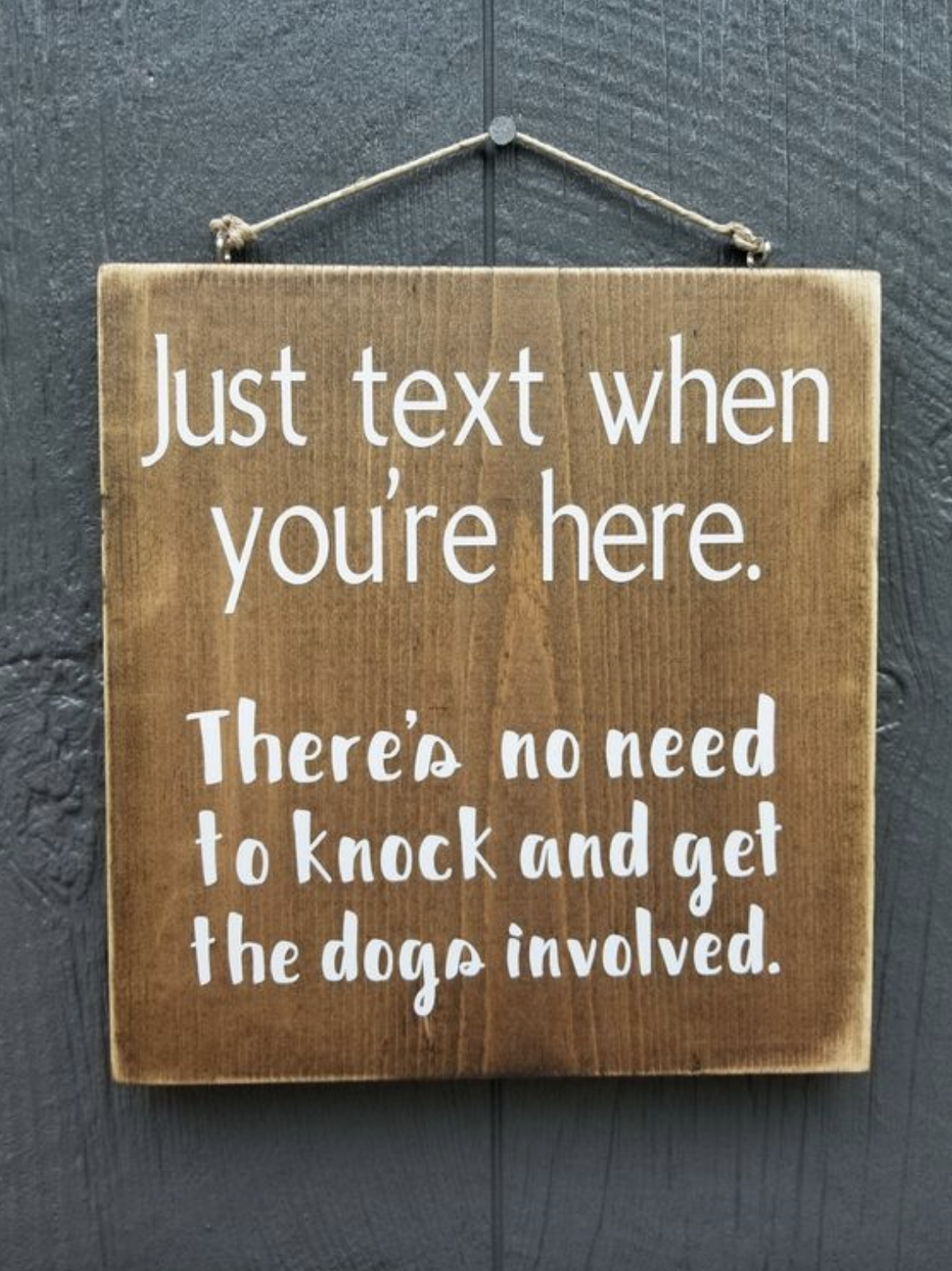 door sign says to text upon arrival