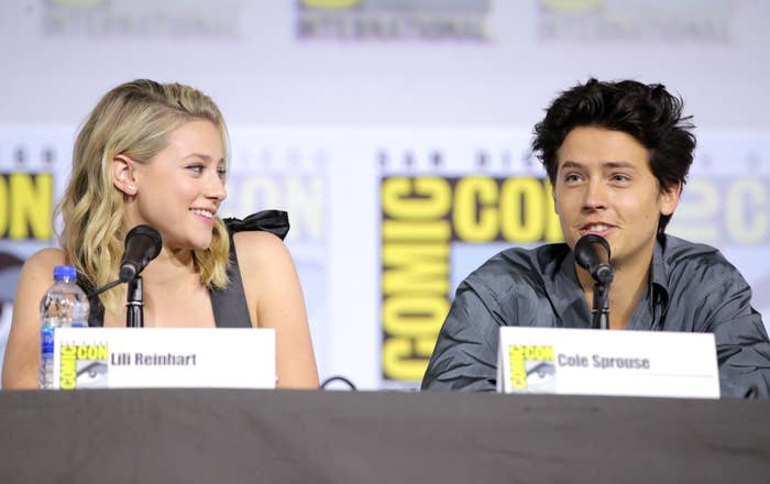Closeup of Lili Reinhart and Cole Sprouse at a Comic Con panel