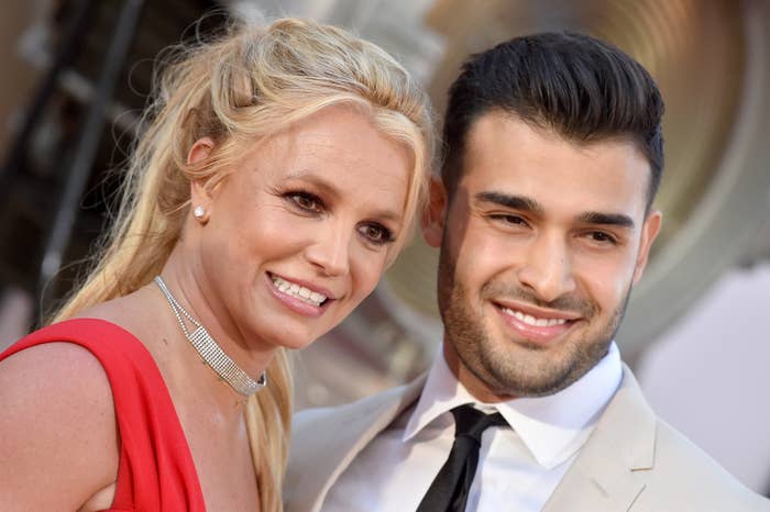 A close-up of Britney and Sam Asghari smiling at an event