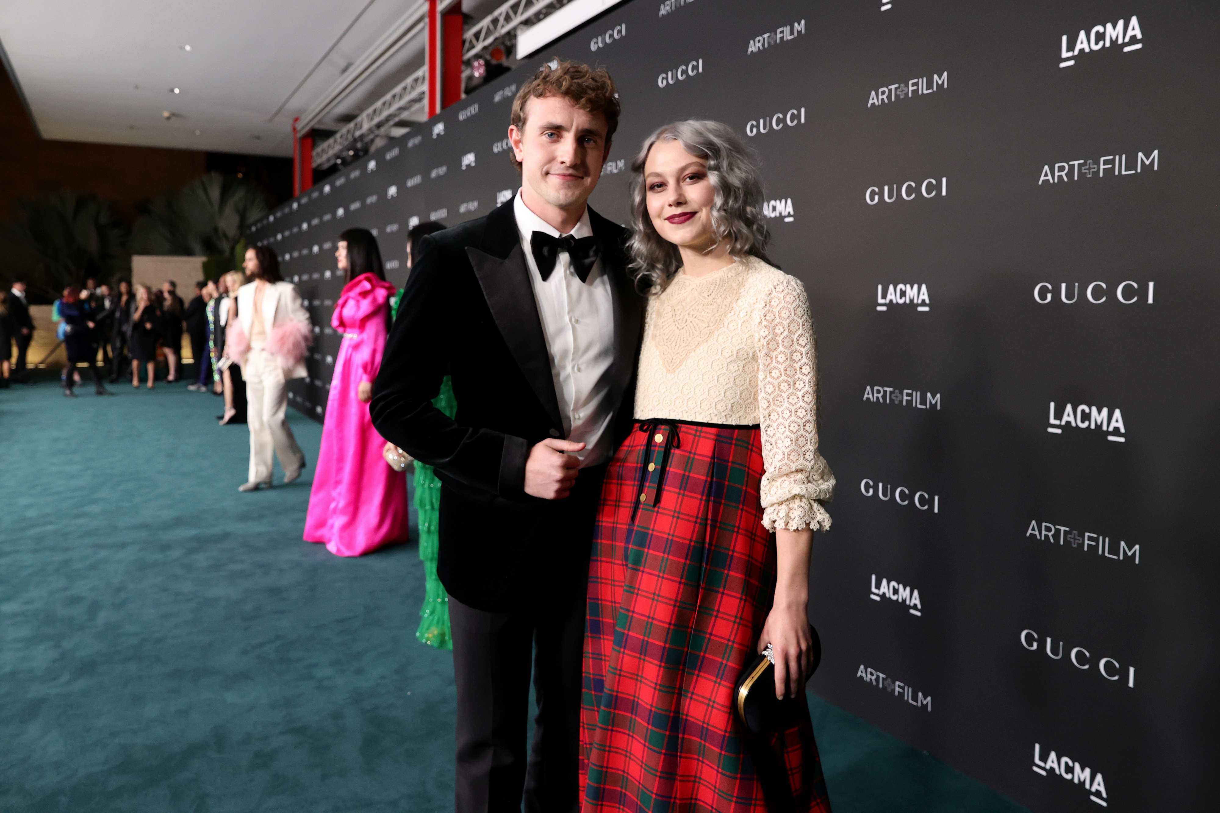 Close-up of Paul and Phoebe at a media event