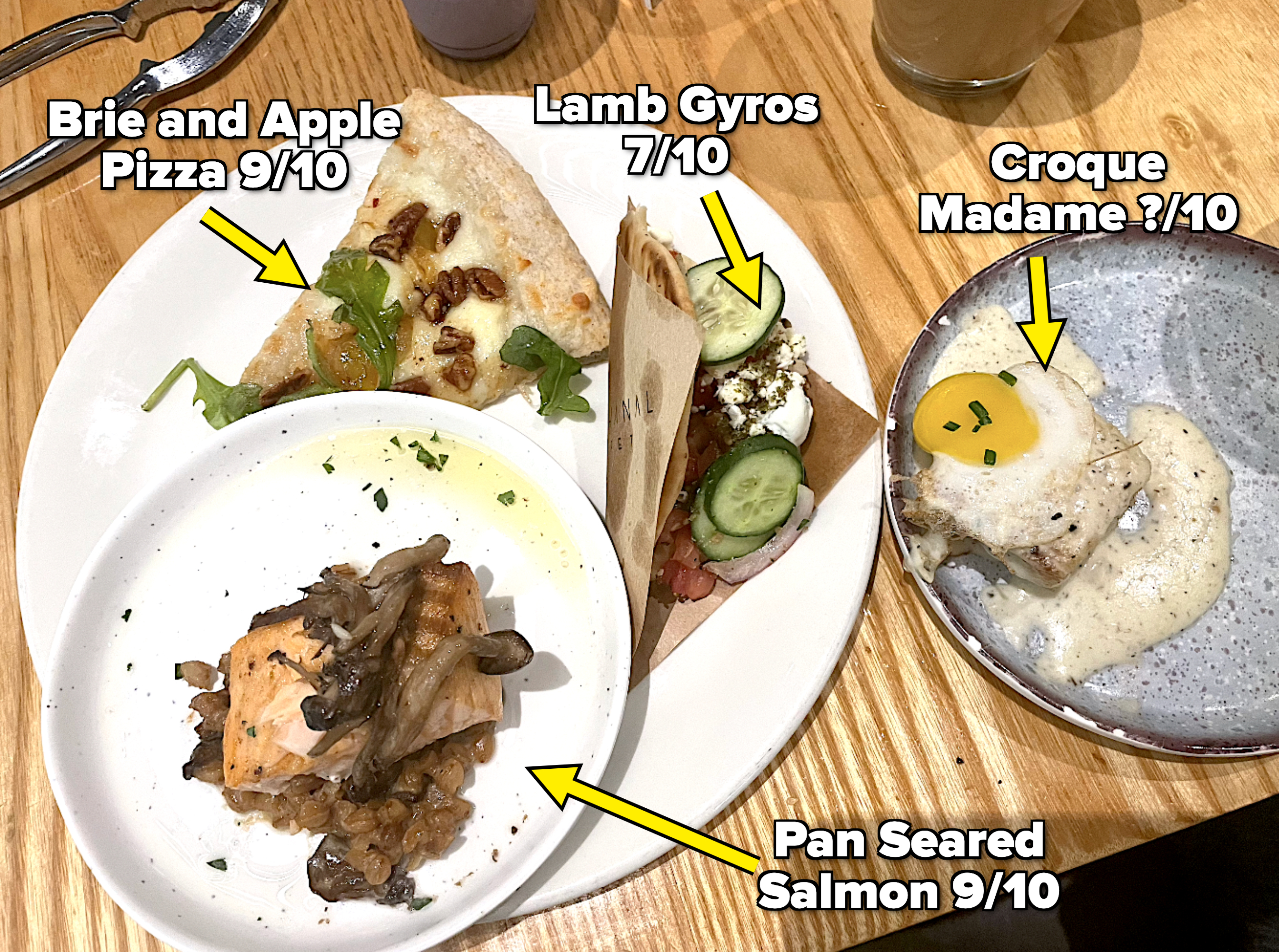 A plate full of food with arrows pointing to each item and providing ratings; the lowest rating is a 7 and the highest is a 9