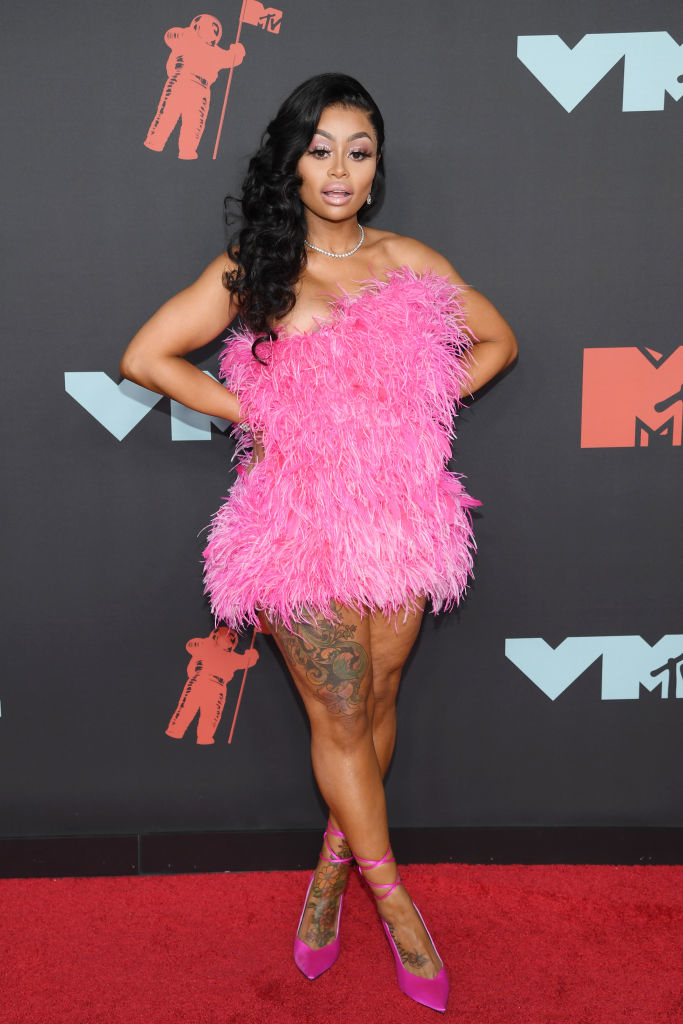 Blac Chyna in a mini feather dress on the red carpet