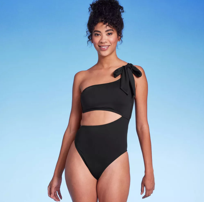 a model wearing the black swimsuit