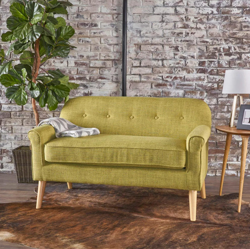 the loveseat in the muted green colorway