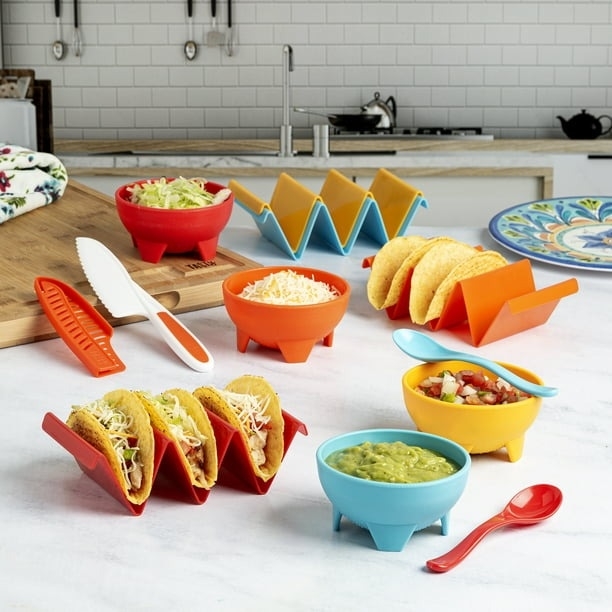 Tacos and toppings in taco holders and bowls
