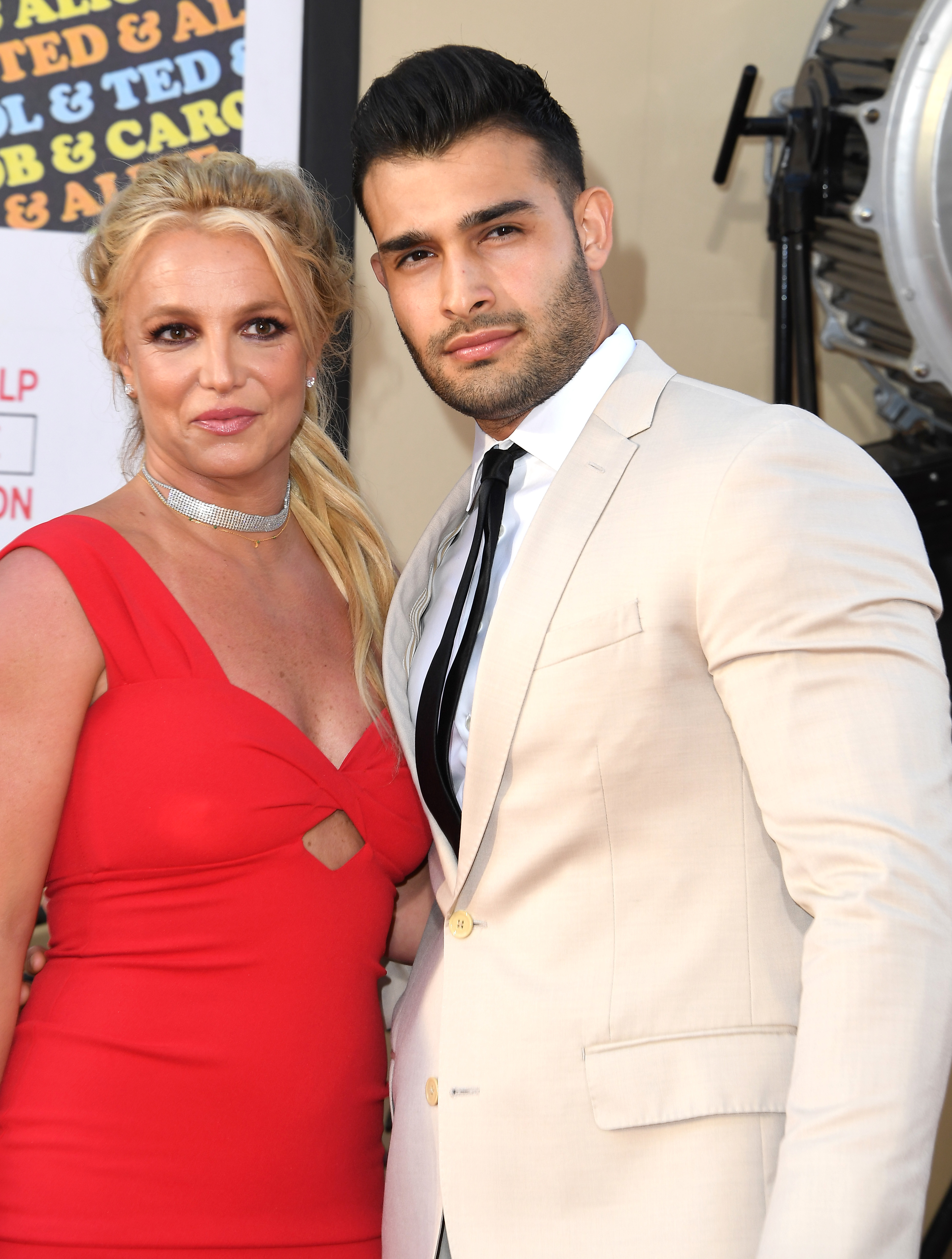 Close-up of Britney and Sam at a press event