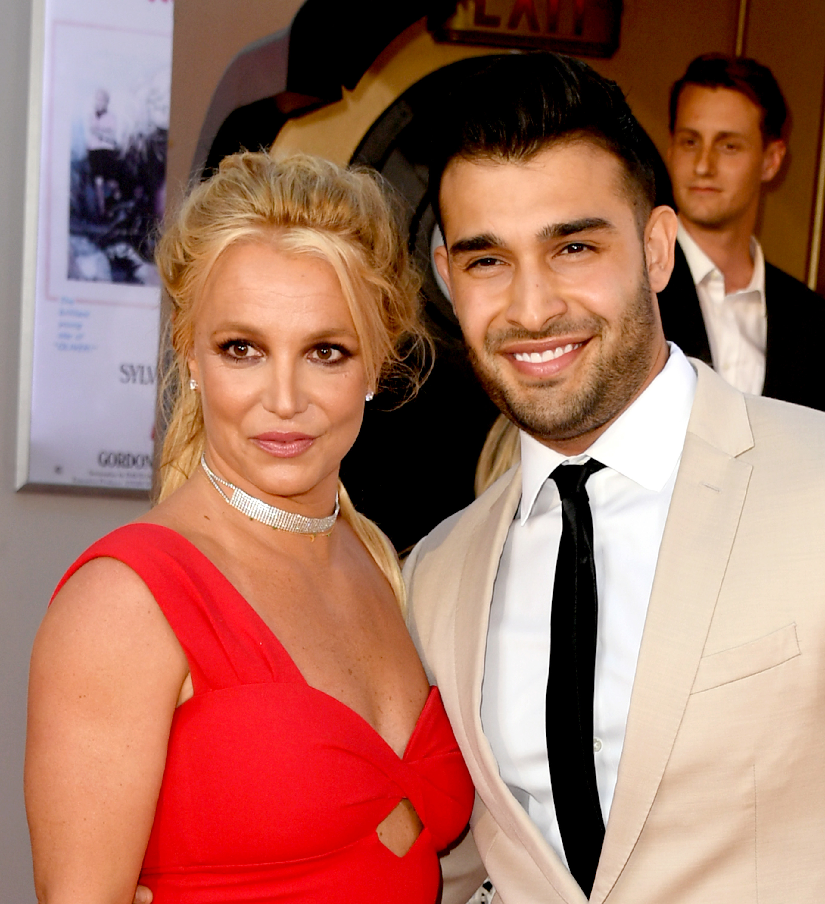 Close-up of Britney and Sam at a press event