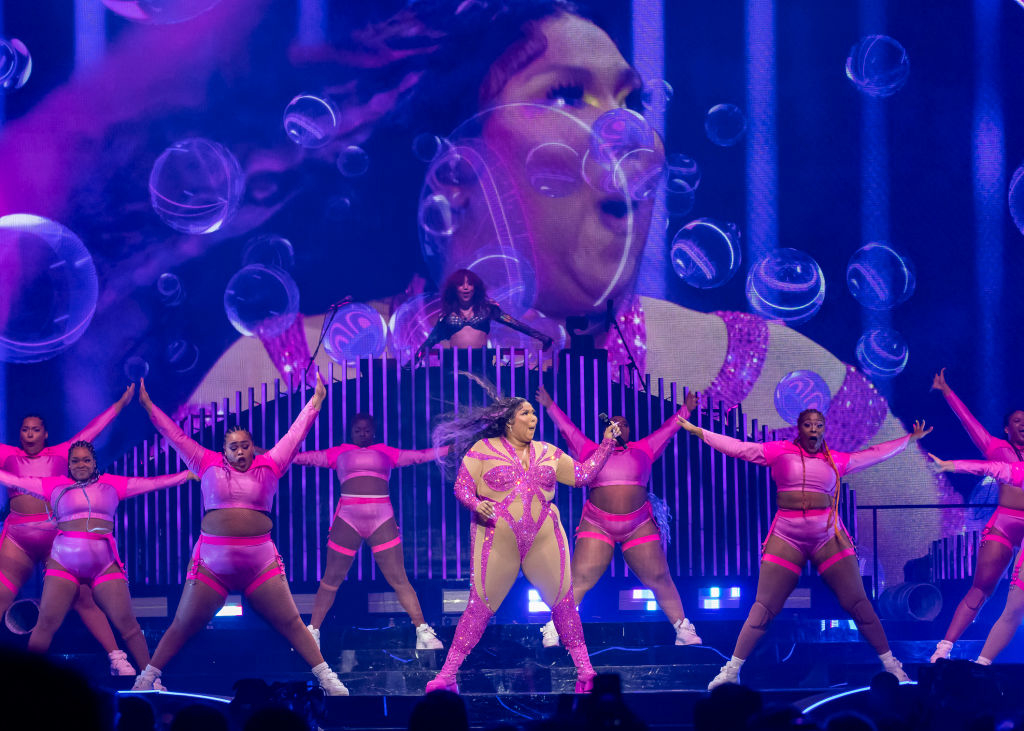 Close-up of Lizzo and her dancers onstage