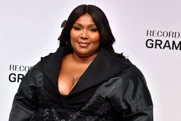 Close-up of Lizzo smiling at a media event