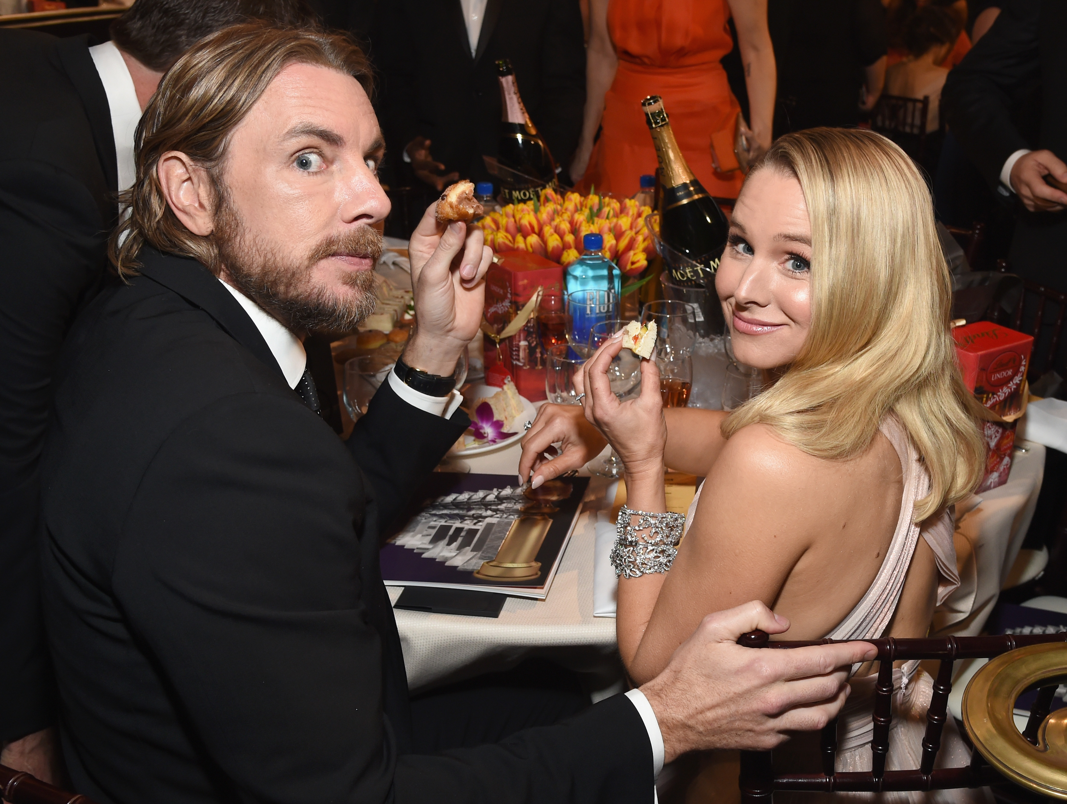 Dax and Kristen sitting at a table at an event