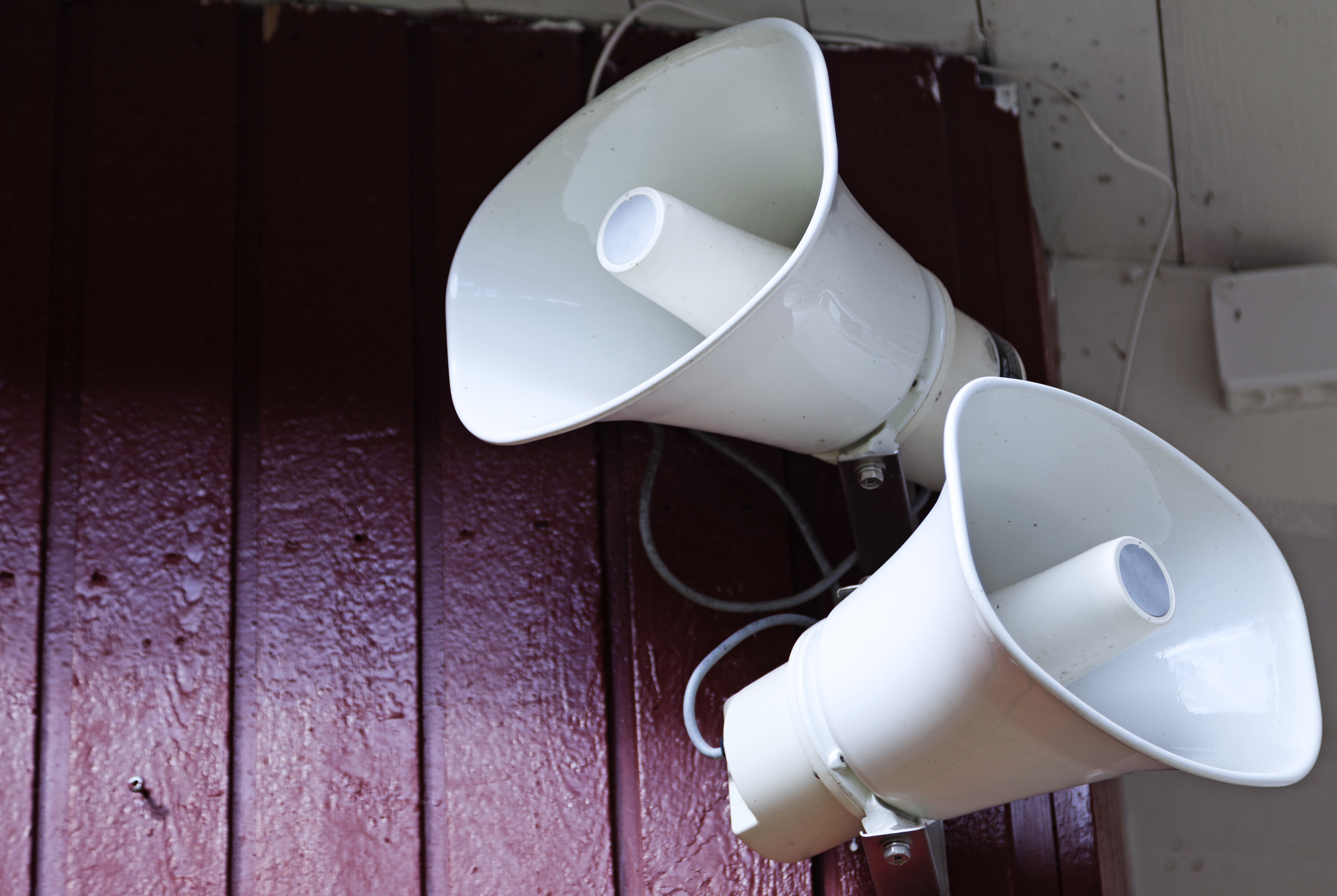 Two speakers against a wall