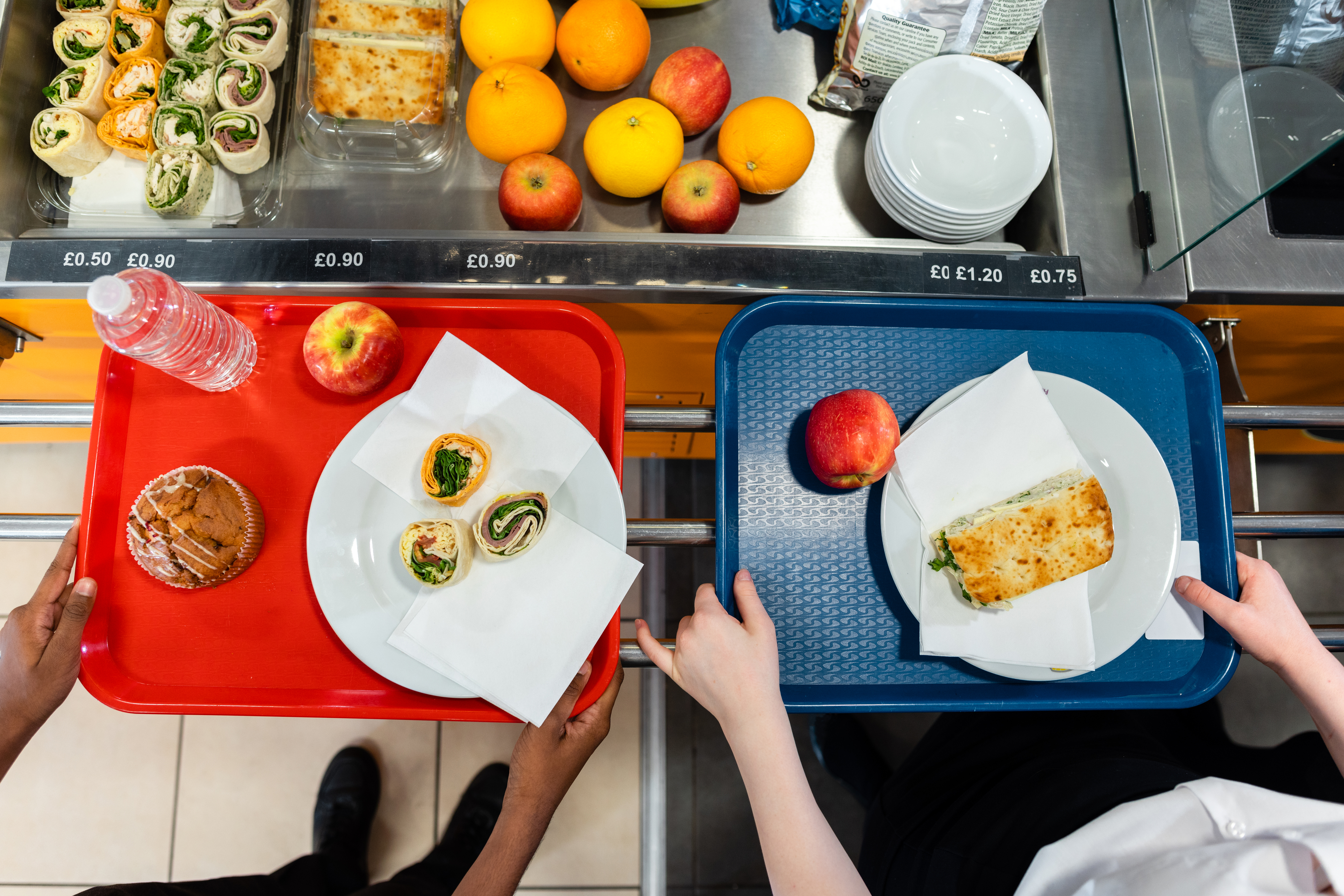 Students getting their lunch in the cafeteria