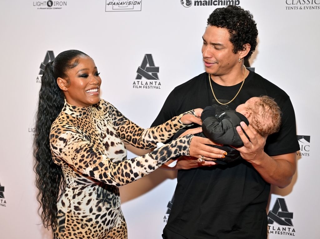 Keke and Darius two with their baby at an event