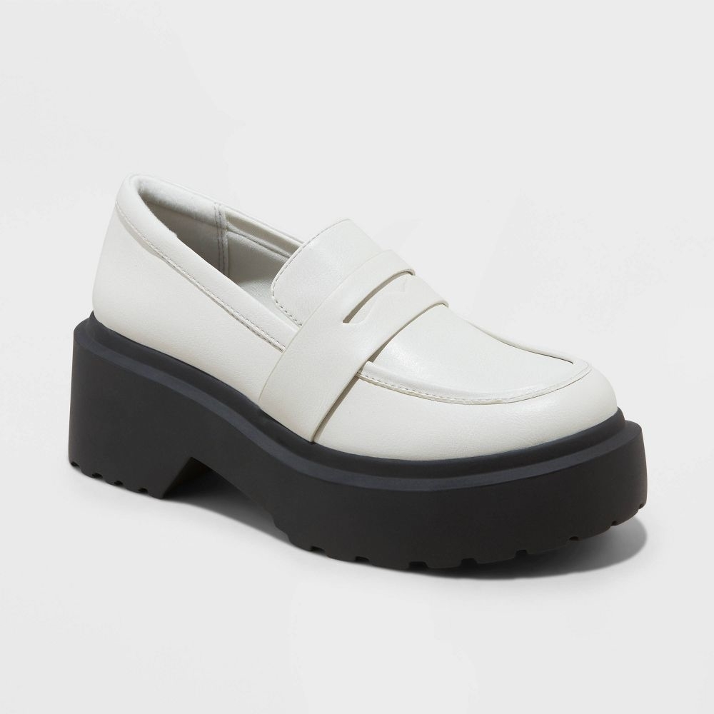 the white loafers