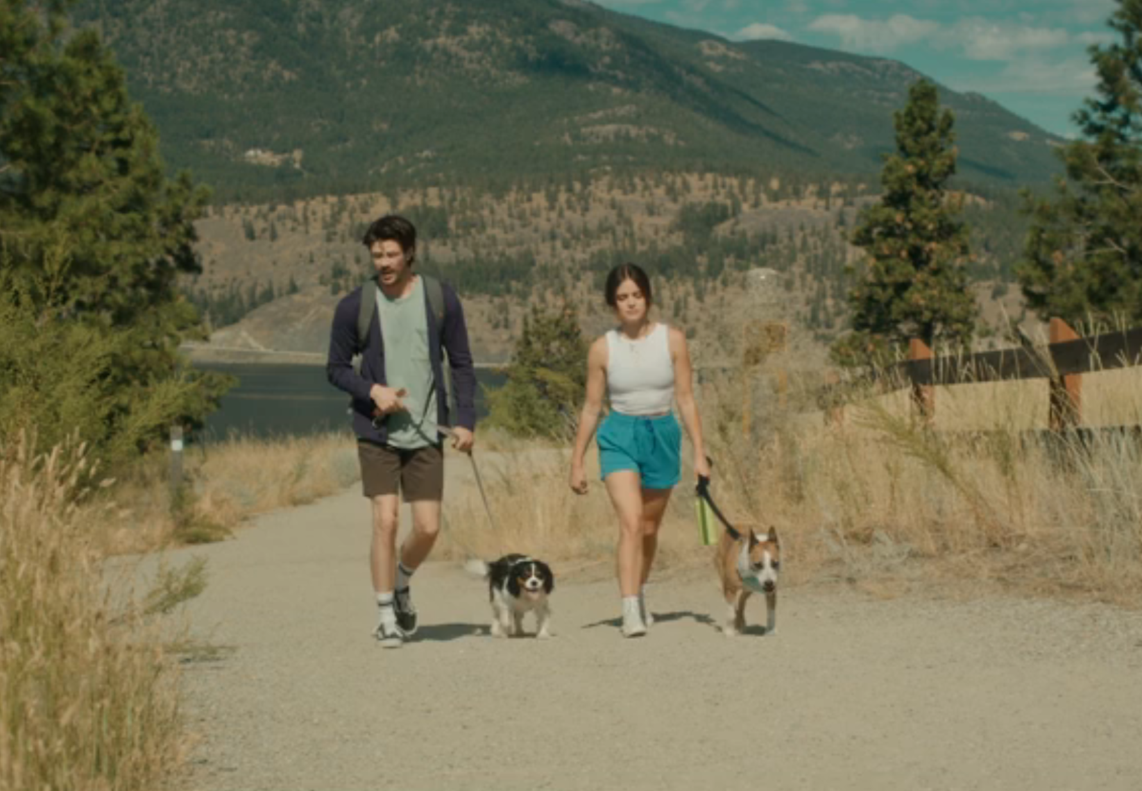 grant gustin and lucy hale taking dogs for a hike