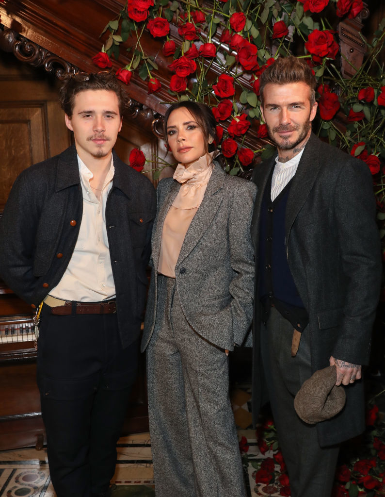 Brooklyn with Victoria and David Beckham