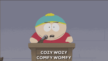 Cartman from &quot;South Park&quot; standing at a podium saying &quot;Cozy wozy, comfy womfy&quot;