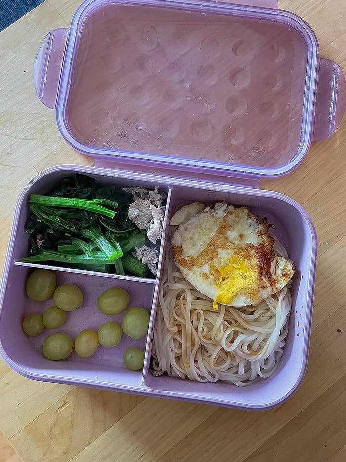 Reviewer image of the purple lunch box filed with food