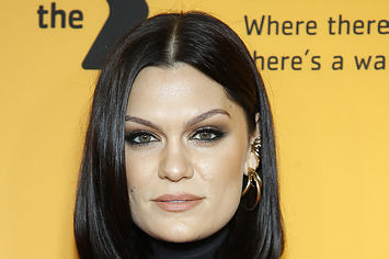 Jessie J poses for a photo on the red carpet