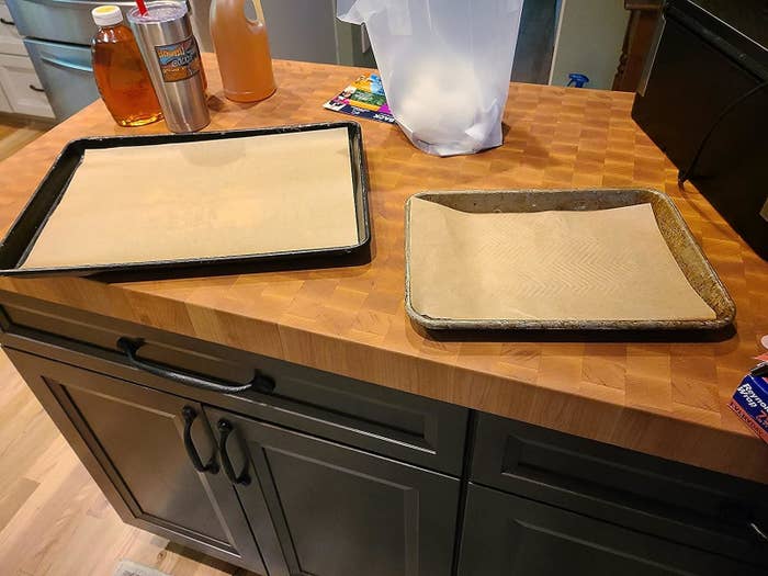 Reviewer image of the parchment paper sheets lining two baking sheets