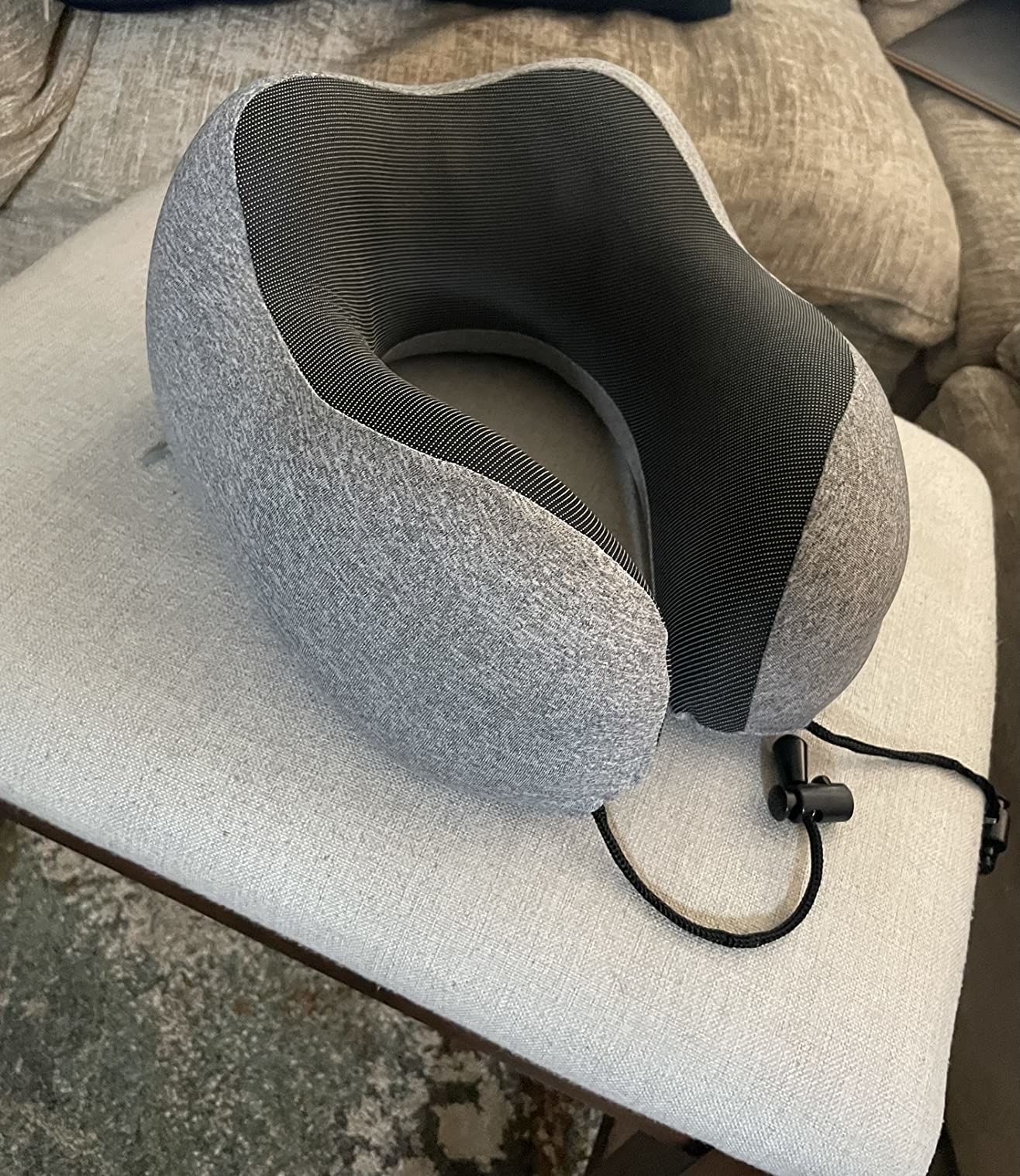 Reviewer image of the gray travel pillow