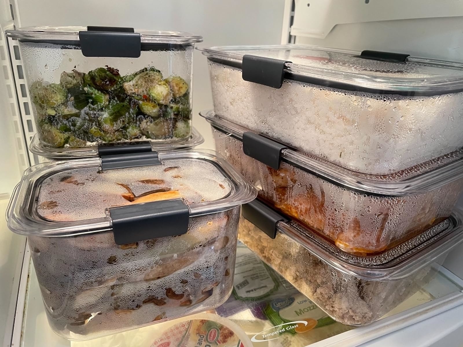 Reviewer image of the containers filled with food in their fridge