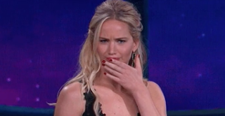 Jennifer Lawrence covering her mouth