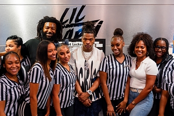 https://img.buzzfeed.com/buzzfeed-static/static/2023-08/2/18/campaign_images/e5aa239ca8f0/lil-baby-donates-300000-worth-of-sneakers-and-sch-3-421-1691001154-1_big.jpg