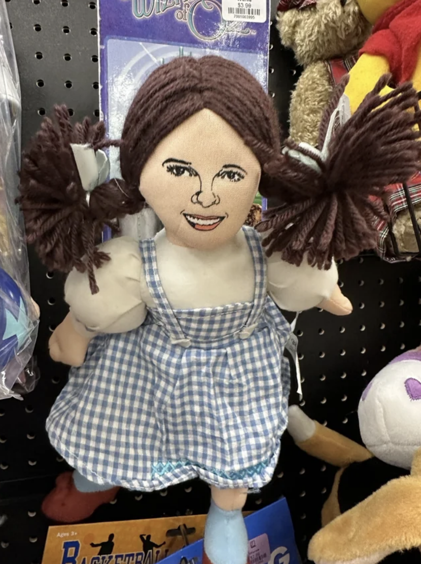A Raggedy Ann–type Dorothy doll from The Wizard of Oz with a sinister smile and strangely adult face
