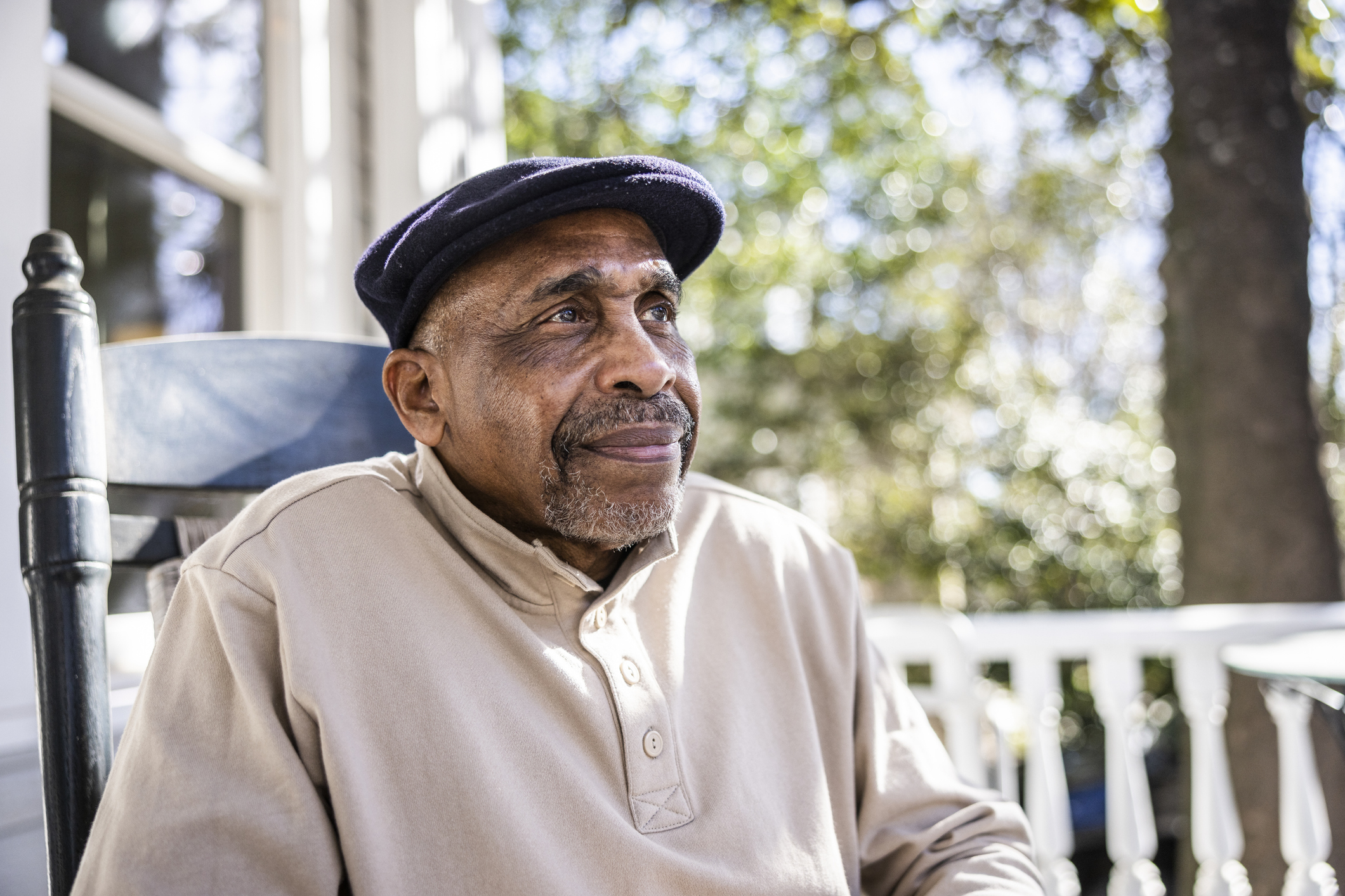 A man sitting in a rocking chair